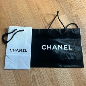 2 CHANEL Black & white Shopping Bags with White Camellia
